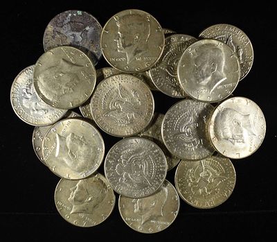 (20) KENNEDY HALF DOLLARS 40% SILVER. WEEKLY COIN & CURRENCY AUCTIONS ESTIMATE $300 - $350.
