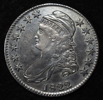 1822 CAPPED BUST HALF DOLLAR AU. LEADERS IN ON-LINE AUCTIONS ESTIMATE $500 - $600.