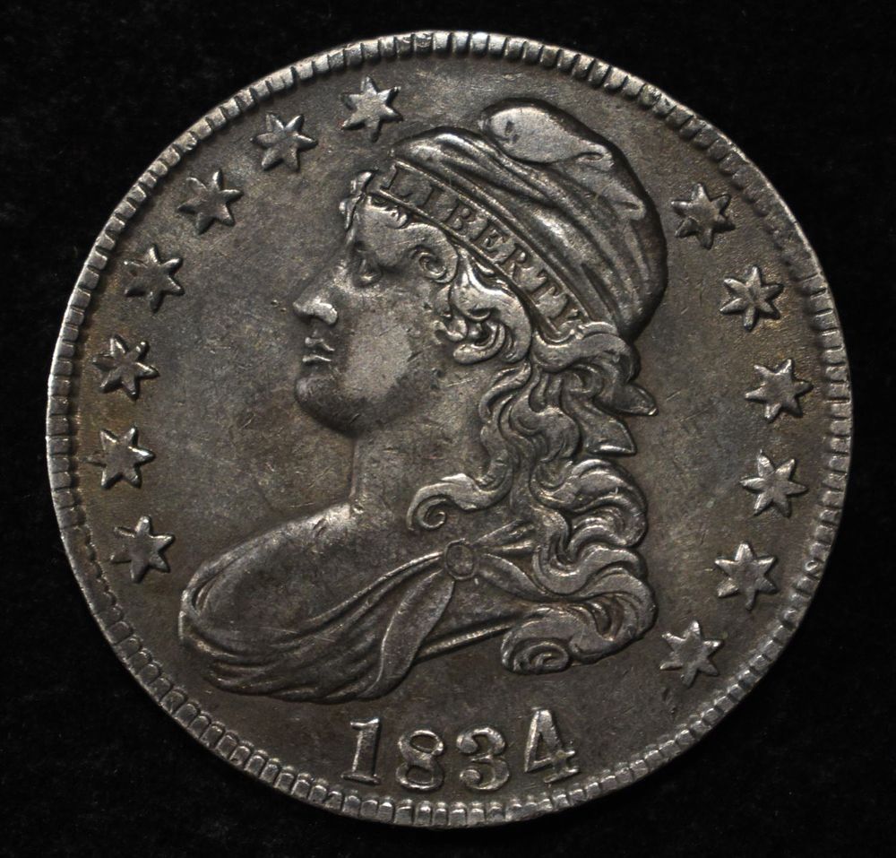 1834 CAPPED BUST HALF DOLLAR AU. WEEKLY COIN & CURRENCY AUCTIONS ESTIMATE $330 - $380.