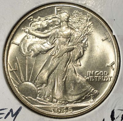 1945 WALKING LIBERTY HALF DOLLAR GEM BU. CHECK OUT OUR UPCOMING AUCTIONS ESTIMATE $110 - $160.