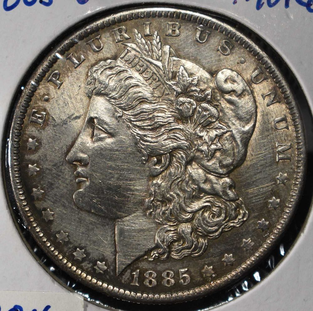 1885-O MORGAN DOLLAR. LEADERS IN ON-LINE AUCTIONS ESTIMATE $120 - $170.
