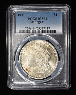1921 MORGAN DOLLAR PCGS MS-64. BID WITH SILVER CITY AUCTIONS ESTIMATE $130 - $150.