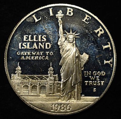 1986-S DOLLAR COMMEM STATUE OF LIBERTY. WEEKLY COIN & CURRENCY AUCTIONS ESTIMATE $90 - $130.