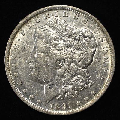 1891-O MORGAN DOLLAR AU. WEEKLY COIN & CURRENCY AUCTIONS ESTIMATE $150 - $200.