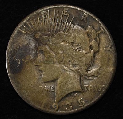 1935-S PEACE DOLLAR. BID WITH SILVER CITY AUCTIONS ESTIMATE $90 - $130.