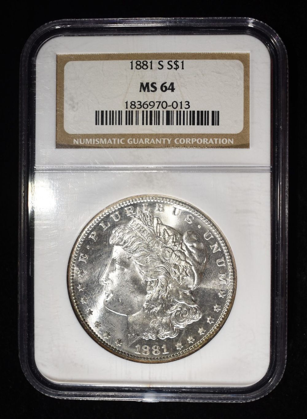1881-S MORGAN DOLLAR NGC MS64. BID WITH SILVER CITY AUCTIONS ESTIMATE $150 - $200.