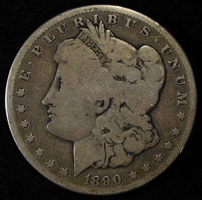1890-CC MORGAN DOLLAR GOOD. LEADERS IN ON-LINE AUCTIONS ESTIMATE $150 - $200.