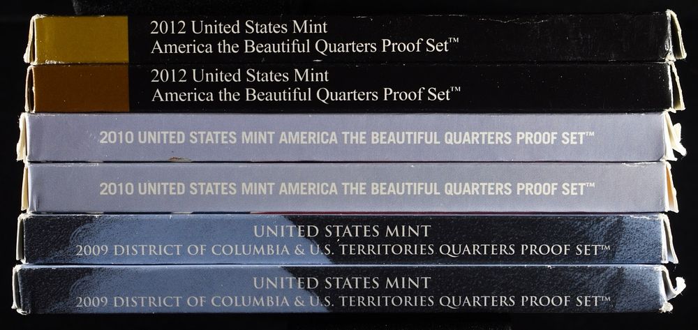 (2) 2009, 2010 & 2012 QUARTERS PROOF SETS. CHECK OUT OUR UPCOMING AUCTIONS ESTIMATE $80 - $120.