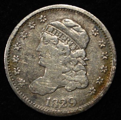 1829 CAPPED BUST HALF DIME. BID WITH SILVER CITY AUCTIONS ESTIMATE $120 - $160.