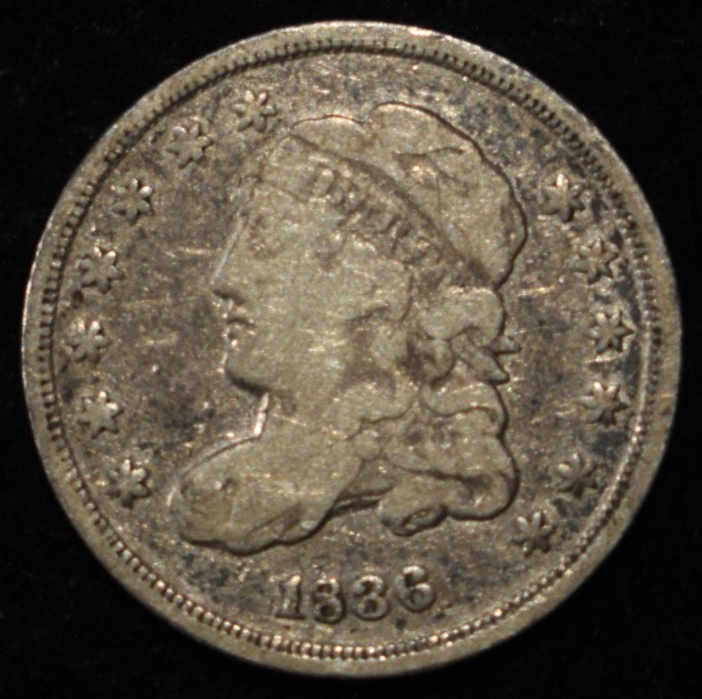 1836 CAPPED BUST HALF DIME. WEEKLY COIN & CURRENCY AUCTIONS ESTIMATE $80 - $120.