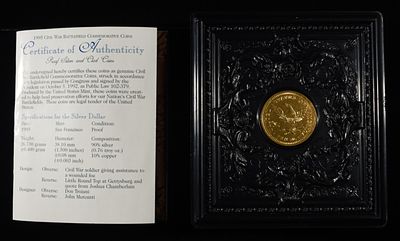 1995-S COMMEM $1 AND 50C. BID WITH SILVER CITY AUCTIONS ESTIMATE $150 - $200.