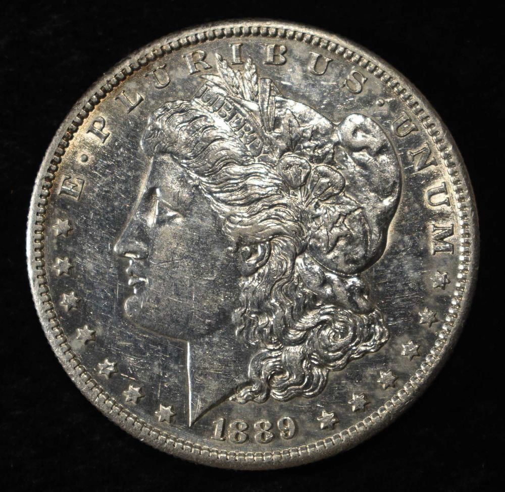 1889-S MORGAN DOLLAR AU. WEEKLY COIN & CURRENCY AUCTIONS ESTIMATE $100 - $130.