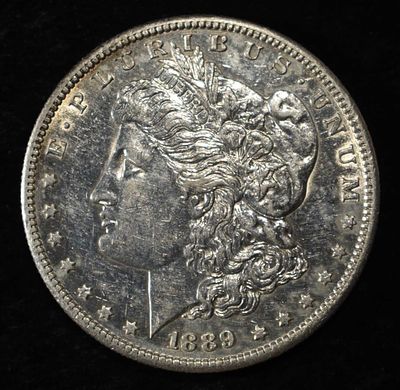 1889-S MORGAN DOLLAR AU. WEEKLY COIN & CURRENCY AUCTIONS ESTIMATE $100 - $130.
