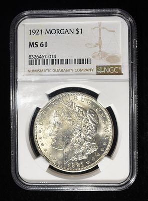 1921 MORGAN DOLLAR NGC MS61. WEEKLY COIN & CURRENCY AUCTIONS ESTIMATE $80 - $120.