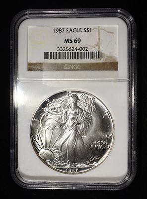 1987 AMERICAN SILVER EAGLE NGC MS69. WEEKLY COIN & CURRENCY AUCTIONS ESTIMATE $110 - $160.