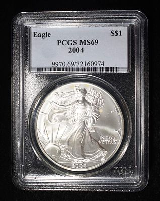 2004 AMERICAN SILVER EAGLE PCGS MS69. CHECK OUT OUR UPCOMING AUCTIONS ESTIMATE $120 - $170.