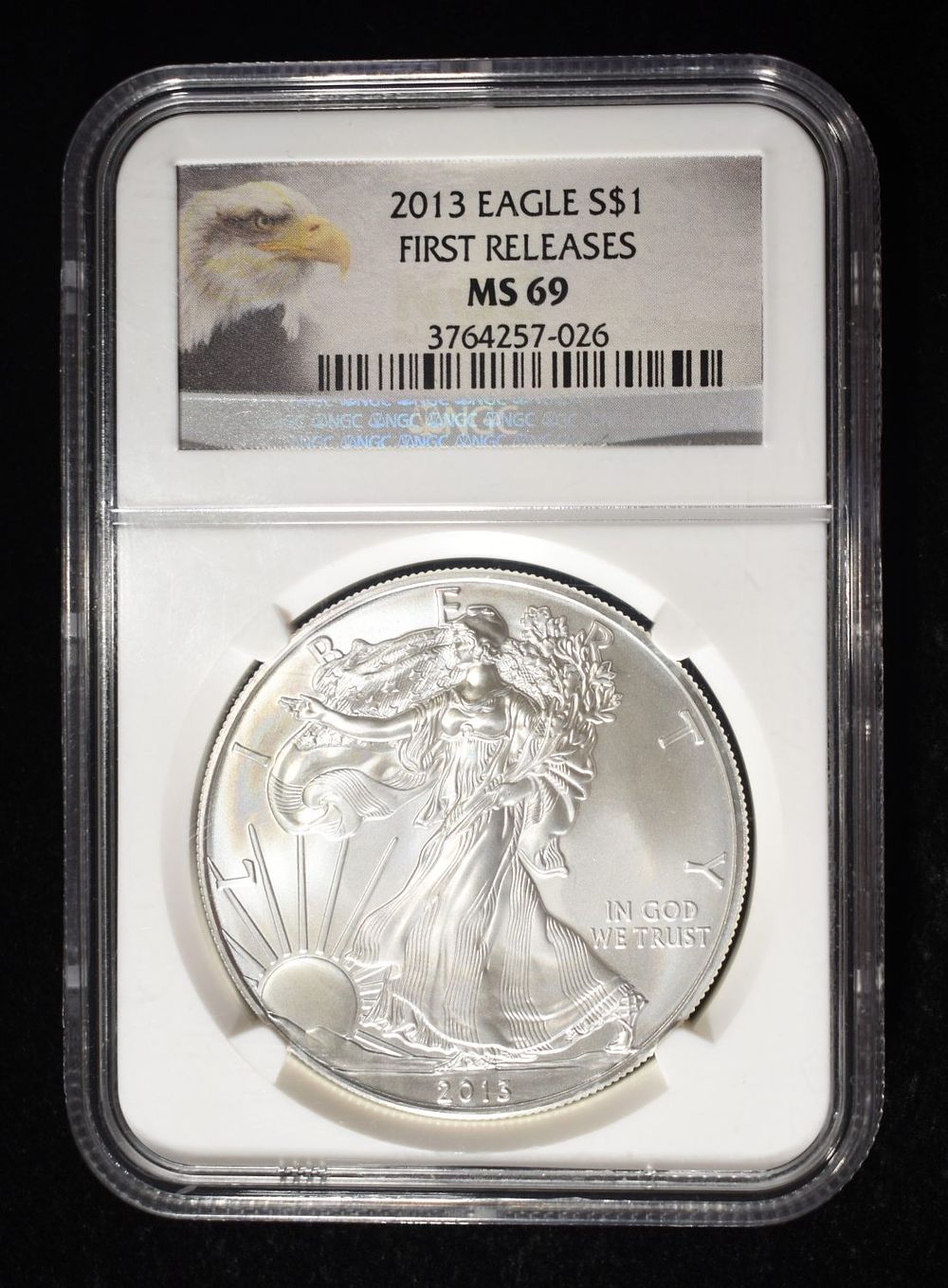 2013 AMERICAN SILVER EAGLE NGC MS69. BID WITH SILVER CITY AUCTIONS ESTIMATE $120 - $170.