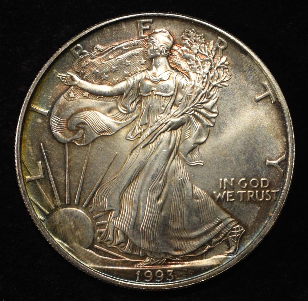 1993 AMERICAN SILVER EAGLE. BID WITH SILVER CITY AUCTIONS ESTIMATE $110 - $160.