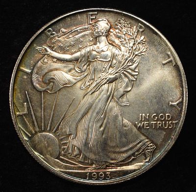 1993 AMERICAN SILVER EAGLE. BID WITH SILVER CITY AUCTIONS ESTIMATE $110 - $160.