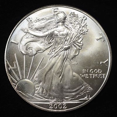 2002 AMERICAN SILVER EAGLE. CHECK OUT OUR UPCOMING AUCTIONS ESTIMATE $110 - $160.