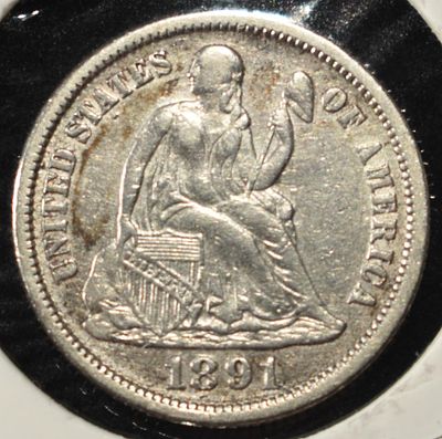 1891 SEATED LIBERTY DIME. TOP RATED AUCTION HOUSE ESTIMATE $100 - $150.