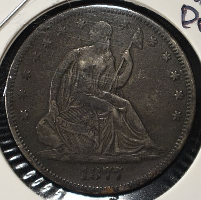1877-S SEATED LIBERTY HALF DOLLAR. SCRATCH ON REV CHECK OUT OUR UPCOMING AUCTIONS ESTIMATE $150 