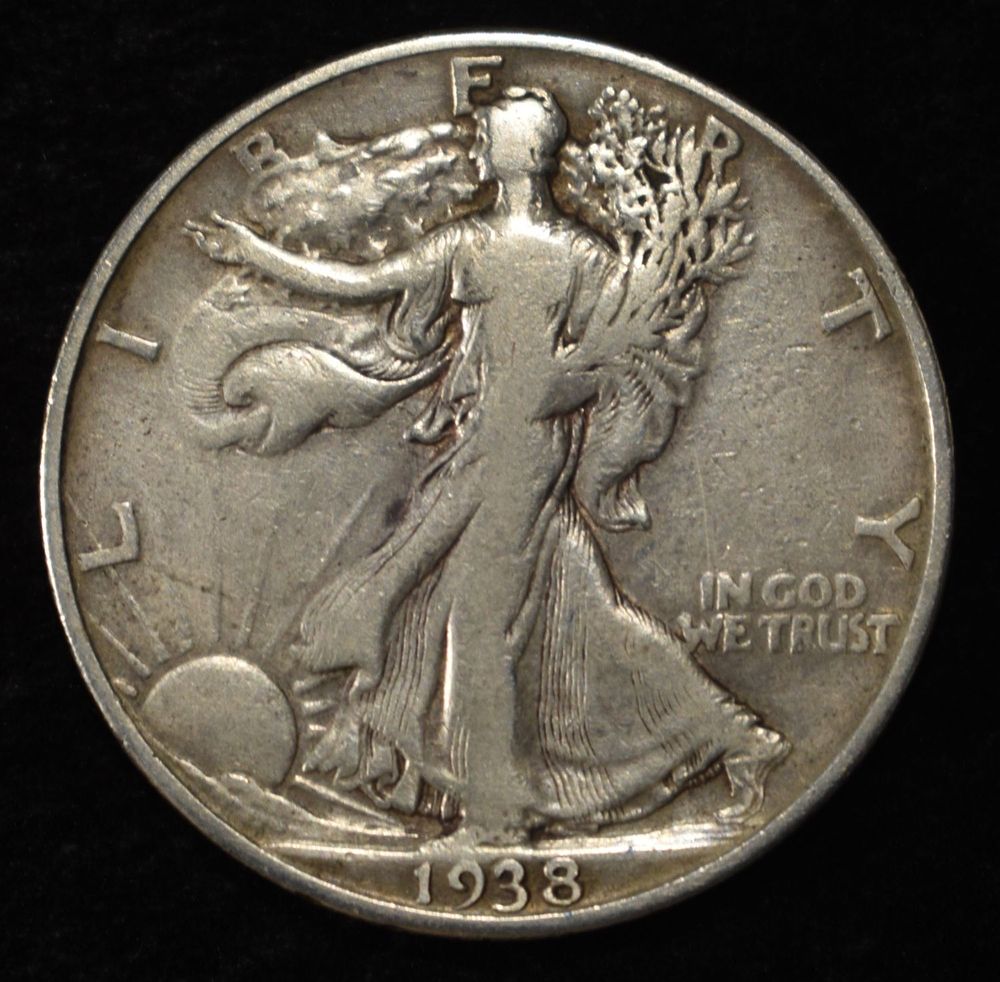 1938-D WALKING LIBERTY HALF DOLLAR XF. BID WITH SILVER CITY AUCTIONS ESTIMATE $130 - $180.