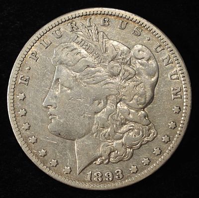 1893-CC MORGAN DOLLAR VF/XF. TOP RATED AUCTION HOUSE ESTIMATE $1700 - $2200.