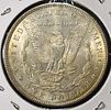 1900 MORGAN DOLLAR. CHECK OUT OUR UPCOMING AUCTIONS ESTIMATE $90 - $130.Image - 1