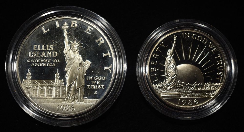 1986 STATUE OF LIBERTY 2 COIN SET. WEEKLY COIN & CURRENCY AUCTIONS ESTIMATE $150 - $200.