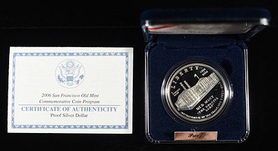 2006-S $1 OLD MINT CENTENNIAL COMMEM DOLLAR. LEADERS IN ON-LINE AUCTIONS ESTIMATE $90 - $130.