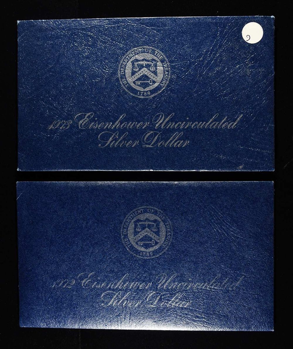 1972 & 1973 EISENHOWER UNC SILVER DOLLAR. CHECK OUT OUR UPCOMING AUCTIONS ESTIMATE $60 - $80.