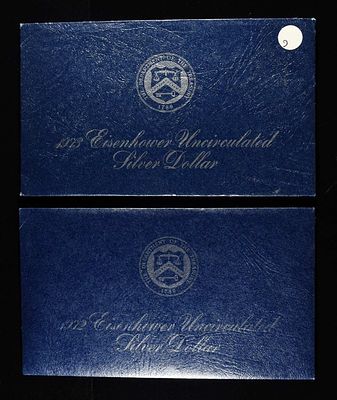 1972 & 1973 EISENHOWER UNC SILVER DOLLAR. CHECK OUT OUR UPCOMING AUCTIONS ESTIMATE $60 - $80.