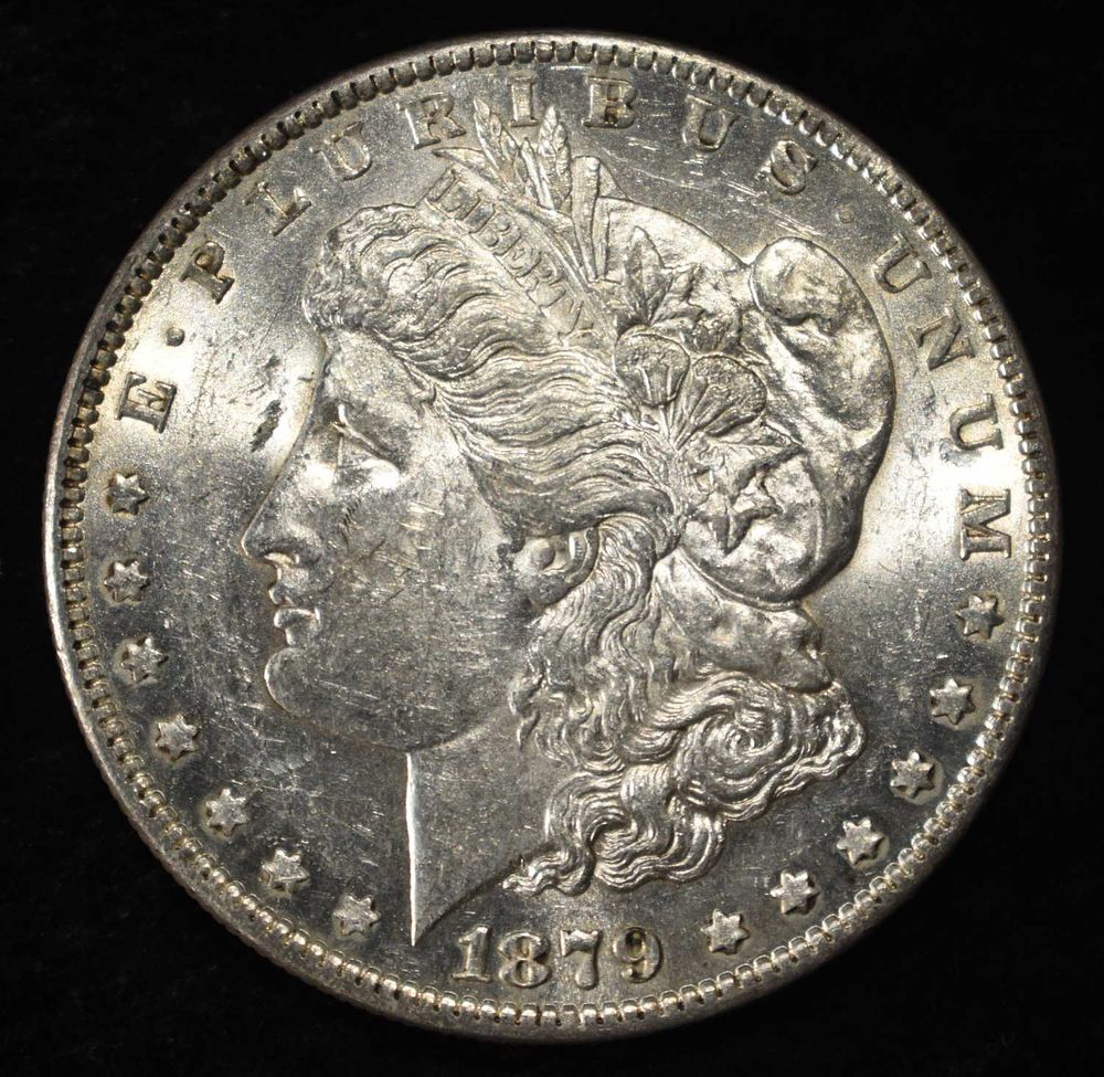 1879-O MORGAN DOLLAR BU. WEEKLY COIN & CURRENCY AUCTIONS ESTIMATE $150 - $200.