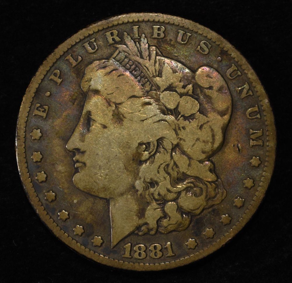 1881-O MORGAN DOLLAR. BID WITH SILVER CITY AUCTIONS ESTIMATE $90 - $130.
