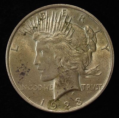 1923 PEACE DOLLAR. BID WITH SILVER CITY AUCTIONS