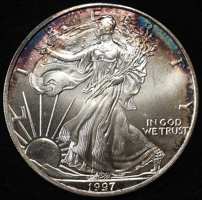 1997 AMERICAN SILVER EAGLE. LEADERS IN ON-LINE AUCTIONS ESTIMATE $110 - $160.