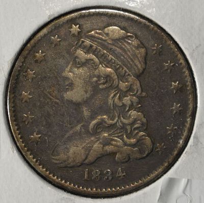 1834 CAPPED BUST QUARTER XF. CHECK OUT OUR UPCOMING AUCTIONS ESTIMATE $470 - $525.