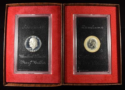 1971-S & 1974-S EISENHOWER DOLLARS BROWN PACKAGING. LEADERS IN ON-LINE AUCTIONS ESTIMATE $75 - $100.
