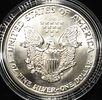 1988 AMERICAN SILVER EAGLE. BID WITH SILVER CITY AUCTIONS ESTIMATE $110 - $160.Image - 1