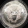 1990 AMERICAN SILVER EAGLE. LEADERS IN ON-LINE AUCTIONS ESTIMATE $110 - $160.Image - 2