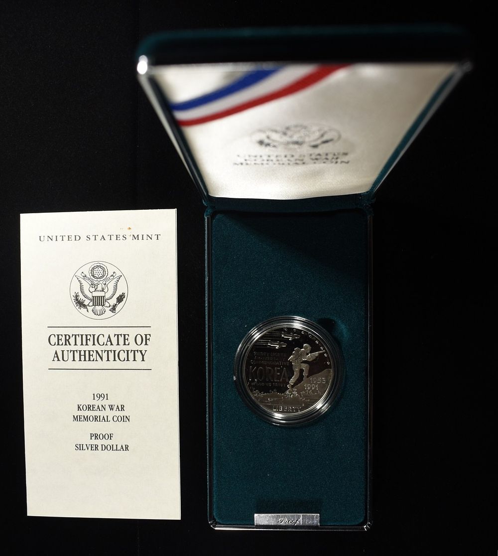 1991 $1 COMMEM KOREAN WAR MEMORIAL. WEEKLY COIN & CURRENCY AUCTIONS ESTIMATE $90 - $130.