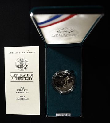 1991 $1 COMMEM KOREAN WAR MEMORIAL. WEEKLY COIN & CURRENCY AUCTIONS ESTIMATE $90 - $130.