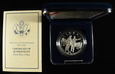 2004 $1 COMMEM LEWIS AND CLARK. COMMEMORATIVE SILVER COINS ESTIMATE $90 - $130.