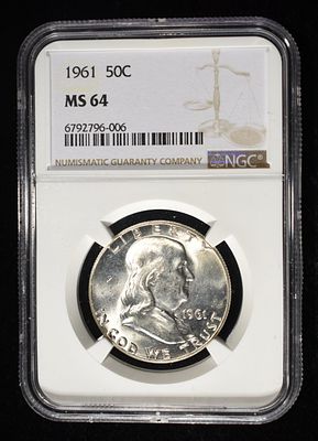 1961 FRANKLIN HALF DOLLAR NGC MS64. BID WITH SILVER CITY AUCTIONS ESTIMATE $40 - $60.