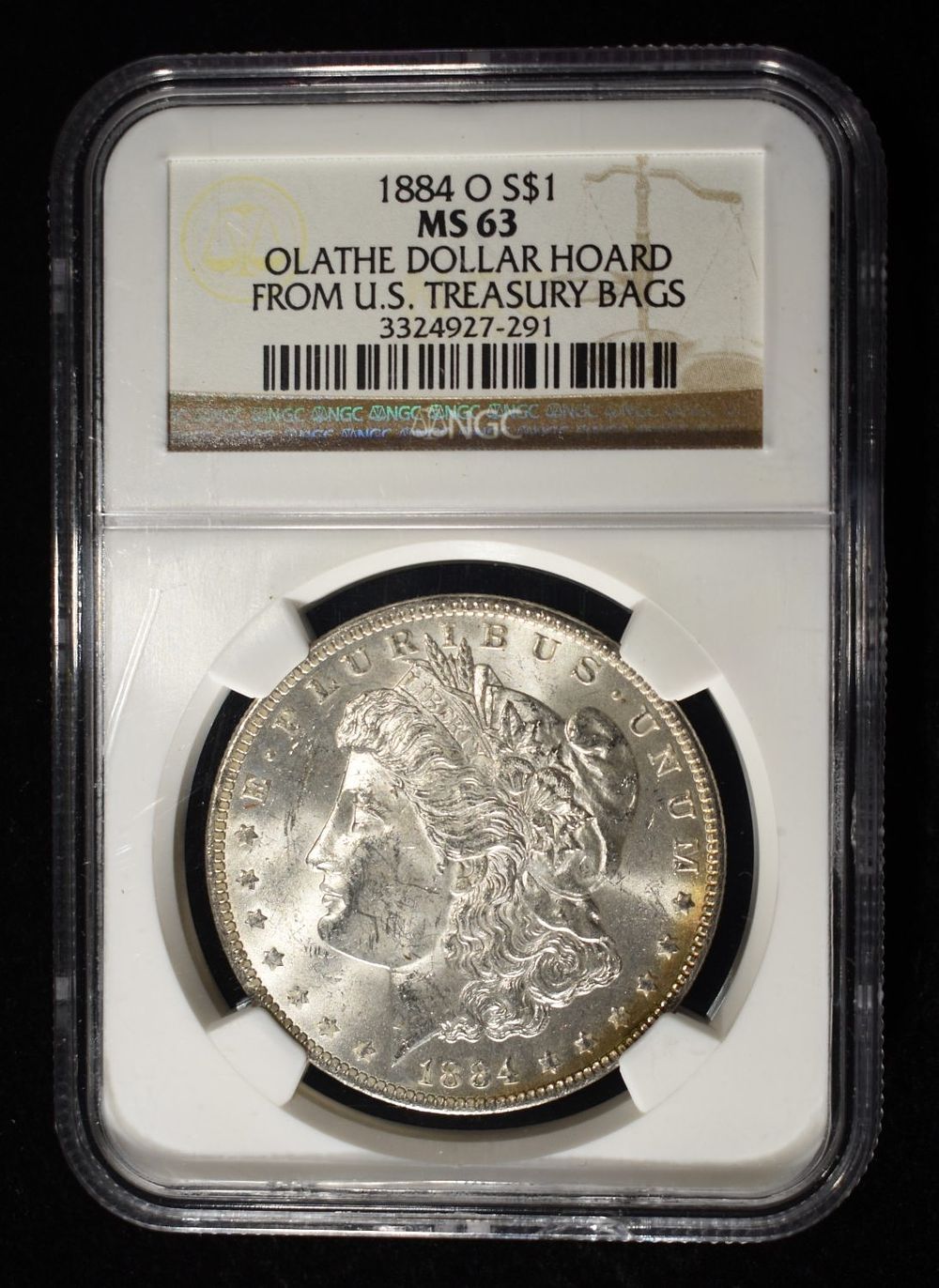 1884-O MORGAN DOLLAR NGC MS-63 OLATHE HOARD. BID WITH SILVER CITY AUCTIONS ESTIMATE $130 - $150.