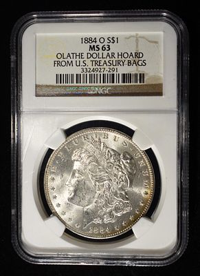 1884-O MORGAN DOLLAR NGC MS-63 OLATHE HOARD. BID WITH SILVER CITY AUCTIONS ESTIMATE $130 - $150.