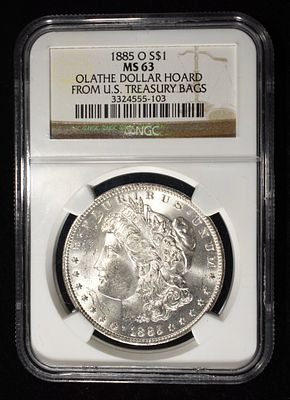 1885-O MORGAN DOLLAR NGC MS-63 OLATHE HOARD. LEADERS IN ON-LINE AUCTIONS ESTIMATE $130 - $150.