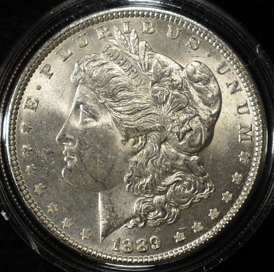 1889 MORGAN DOLLAR CH BU. TOP RATED AUCTION HOUSE ESTIMATE $100 - $130.