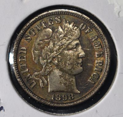 1898 BARBER DIME ORIG AU/UNC. BID WITH SILVER CITY AUCTIONS ESTIMATE $110 - $160.